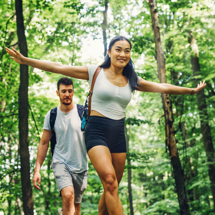 couple hiking in the forest